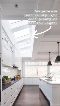 an image of a kitchen setting with skylights above the counter top and below the cabinets