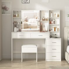 a bedroom with a bed, desk and shelves on the wall next to each other