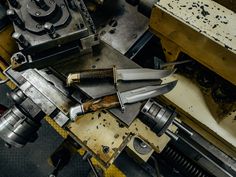 there are many different types of tools in the machine room, including scissors and other items