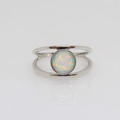 Vintage Sterling Silver White Opal Ring ...Marked 925...Total of weights 2.2grams...Size 8...Measure of stone center 10.2MM...It's in very good condition.  A Silver Minimalist Opal Rings, Silver Stackable Rings With Gemstone, Silver Stackable Rings With Round Gemstones, White Gold Stackable Crystal Ring, White Gold Sterling Silver Opal Open Ring, Sterling Silver Double Band Rings With Polished Finish, Minimalist Silver Stackable Opal Ring, Adjustable Silver Rings With Round Stone, Silver Sterling Silver Opal Ring