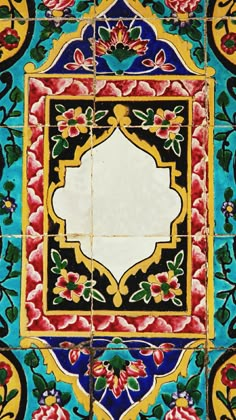 an artistic tile design with flowers and leaves