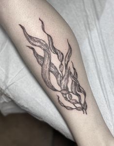 a person with a tattoo on their arm