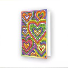 a colorful card with hearts on it