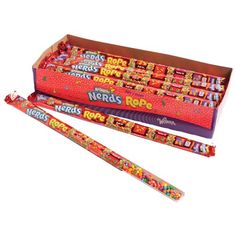 a box of nerds rope candy with two sticks in the front and one on the back