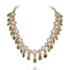 Dive into the symphony of elegance designed to make you feel like royalty! Adorn this one-of-a-kind jewelry set mesmerizing with radiant mint stones that beautifully complements green beads along with sparkling CZ stones and delicate kundan accents with white moti, creating a spellbinding glow. The set includes a necklace and a pair of straight drop earrings. Approximate earrings length is 2". Designed over high-quality brass as base metal with silver and gold plating. In-stock & ready-to-ship. Heritage Jewellery, Green Beads, Waist Chain, Head Accessories, Gift Card Shop, Green Bead, Cz Stone, Base Metal, Men's Collection