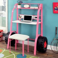 a pink computer desk with a laptop on it