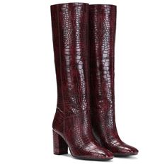 Meet Saint Emily, the new classic. Set the trend this season in these croco embossed vegan leather knee high boots from SaintG, these boots are sure to turn heads. Featuring knee high shaft, wide calf, a pointed toeline and covered block mid high heels. Full nude color genuine leather lined for a luxurious feel, cushioned leather insole provides lasting comfort. The slip on closure boot sit on a tunit sole. Brand Name - Saint G Upper - Croco Embossed Vegan Leather Lining - Full Leather Insole - Vegan Leather Boots, Leather Knee High Boots, High Ankle Boots, Pumps Heels Stilettos, Knee High Leather Boots, Sheep Leather, Wide Calf, Boot Bag, Long Boots