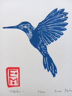 a blue bird flying over a red and white envelope with chinese writing on the front