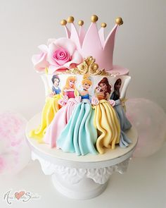 there is a cake that has princesses on it