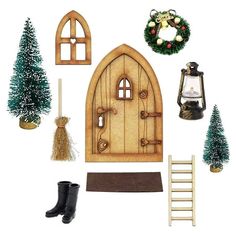 an assortment of christmas decorations including a wooden door