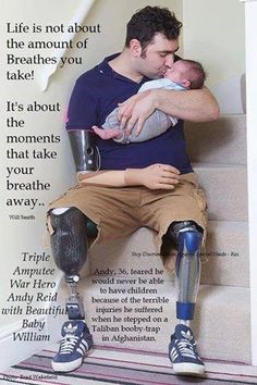 a man holding a baby sitting on top of a stair case with the words thank you for your service