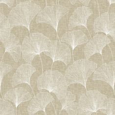 a beige and white wallpaper with large leaves