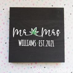 a wooden sign that says,'mr and mrs williams est 2021'on it