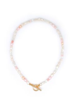 Necklace in beautiful pastel tones consisting of various genuine and high-quality pearls with a toggle clasp made of gold-plated 925 silver. MATERIAL Clasp: 925 silver 24K gold plated Pearls: - Freshwater pearls Keshi white - Freshwater pearls pink and peach - Moonstone white faceted - Andean opal pink faceted - Rock crystal Size Length of the necklace with clasp: approx. 39 cm Pink Necklace, Peach Moonstone, White Freshwater Pearl, Real Pearls, Pink Peach, Rock Crystal, Silver Material, Toggle Clasp, Favorite Jewelry