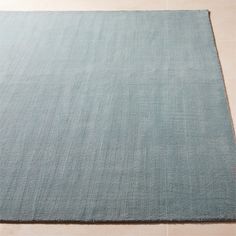 a large blue rug on the floor