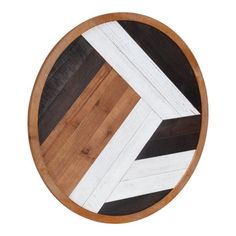 a wooden plate with white and black stripes on it