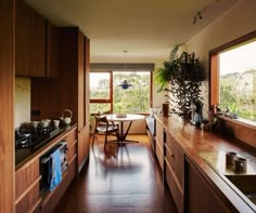 the kitchen is clean and ready to be used as a dining room or living room