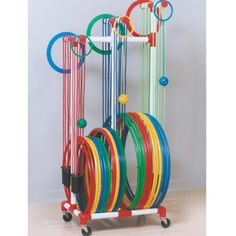 a rack with many different colored rings on it