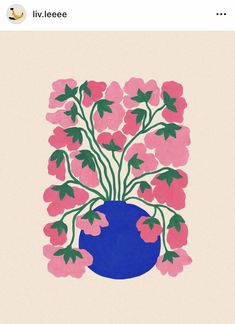 a blue vase with pink flowers in it