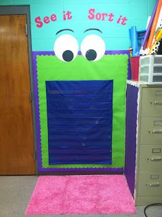 an office door decorated to look like oscar the frog