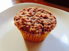 a close up of a muffin on a plate