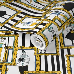 an image of a wallpaper with black and yellow designs on the walls, including clowns