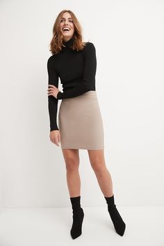 You know that some things never go out of fashion. Whether it’s representing your company at that big event or attending your friend’s birthday party, you can trust this classic, above-the-knee pencil skirt. Its soft waistband offers the perfect support for a slim silhouette, making you comfortable for long hours. As you take prospects through a demo or greet old friends for a brunch, this versatile skirt pairs easily with any sophisticated tops of yours. Made with a blend of rayon, nylon, and s Sleek Pencil Skirt For Date Night In Spring, Fitted Knee-length Mini Skirt For Date Night, Fitted Solid Skirt For Date Night, Fall Pencil Skirt For Night Out, Lined Pencil Mini Skirt For Night Out, Trendy Fall Pencil Mini Skirt, Fitted Skirt For Business Casual In Fall, Trendy Short Stretch Pencil Skirt, Trendy Stretch Pencil Mini Skirt