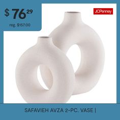 two white vases sitting next to each other on a blue and white background with the same price tag