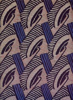 a close up view of an abstract design on a piece of cloth with blue and white stripes