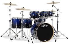 a blue drum set on a white background