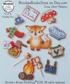 the brochure features cross - stitched items including pins, needles and magnets