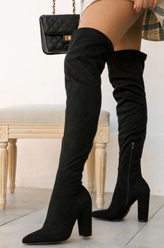 STOCK UNIT: 12B5 SIZE & FIT Shoe Height Approx: 25.75" Heel Height Approx: 4" Boot Entry Circumference: 17.5" True to Size All measurements are made on a size 6.5. There may be slight measurement variations based on size. PRODUCT DETAILS Pull On Style    Back Tie Closure Black Faux Suede Boot  Inward Zipper Closure Black Boots For Women Knee High, Cheap Black Knee-high Boots, Trendy High Heel Boots, Cheap Black Ankle-high Heels, Stelleto Boot Heel Black Dress, Cheap Long Black Boots, Stelleto Boot Heel With Dress, Black Boots For Women Long, Long Black Boots With Heel