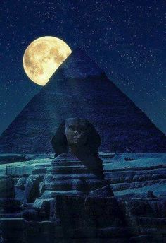 an egyptian pyramid with the moon in the background