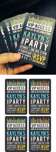 the party ticket is being held by someone's hand and it has colorful lettering on it