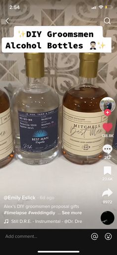 three bottles of alcohol sitting next to each other on a counter with the caption diy groomsmen alcohol bottles