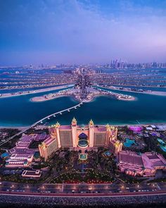 an aerial view of the las vegas hotel and casino resort at night with lights on