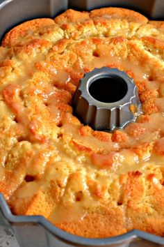 a bundt cake in a pan with icing on top