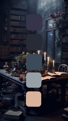 an image of a table with candles and books in the room that is full of books