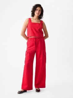 Soft linen-cotton blend pull-on pants.  Elasticized waist with drawcords.  Front slant pockets.  Side cargo pockets.  * Fit: Relaxed.  An easy silhouette throughout.  Note: Oraine Serveille is wearing a Gap Red Full Length Cotton Cargo Pants, Red Relaxed Fit Cotton Pants, Red Full-length Parachute Pants With Pockets, Red Full-length Cotton Cargo Pants, Non-stretch Red Pants With Pockets, Red Pants Outfit, Runway Outfits, Linen Blend Pants, Pant Trends