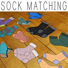 a wooden floor topped with lots of different colored socks