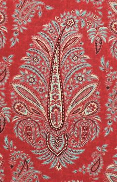 a red and blue paisley print fabric with an intricate design on the bottom half of it