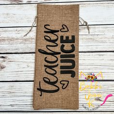 a burlock bag with the words uncle and uncle on it sitting on a wooden surface