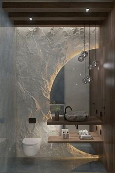 a modern bathroom with marble walls and flooring