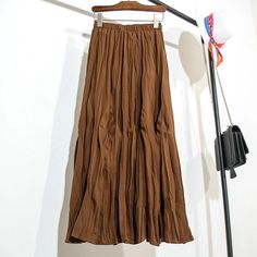 2024 New Vintage Solid Women's Pleated Mi-long Skirts Spring Summer High Waist Korean Casual Umbrella Skirts Female SPECIFICATIONS Material: POLYESTER Style: vintage Fabric Type: blended Waistline: empire Fit Type: LOOSE FIT Silhouette: Pleated Dresses Length: Mid-Calf Size Chart Length(cm) Waist(cm) Hip(cm) ONE SIZE 78 62-100 --Tips -- 1. Please measure your waist size and hip size then compare with our size chart so that you can make a right choice. 2. Please strictly follow the size chart to select the size. Do not select directly according to your habits. 3. Still not sure about size?Please chat with us or message us,We'd love to advisebased on your measurements of bust, waist and hip. 4.The size may have 2-3cm differs due to manual measurement. Please note when you measure. [New In 20 Pleated Dresses, Umbrella Skirt, Korean Casual, Long Skirts, Vintage Fabric, Pleated Dress, New Vintage, Waist Size, Long Skirt