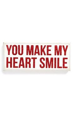 a red and white sticker with the words you make my heart smile on it