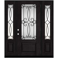 a black door with glass and wrought iron