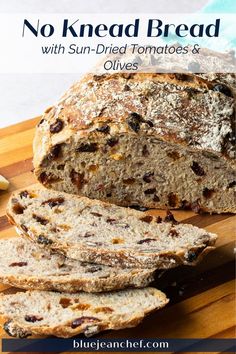 no knead bread with sun - dried tomatoes and olives on a cutting board