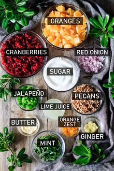 the ingredients for cranberry sauce are shown in bowls on a wooden table with green leaves