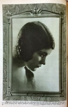 an old photo of a woman's head in a frame on the page of a book