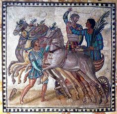 an ancient roman mosaic depicting chariots being pulled by horses